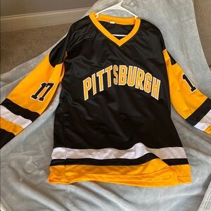 Bryan Rust Autographed Pittsburgh Penguins Black and Yellow Jersey